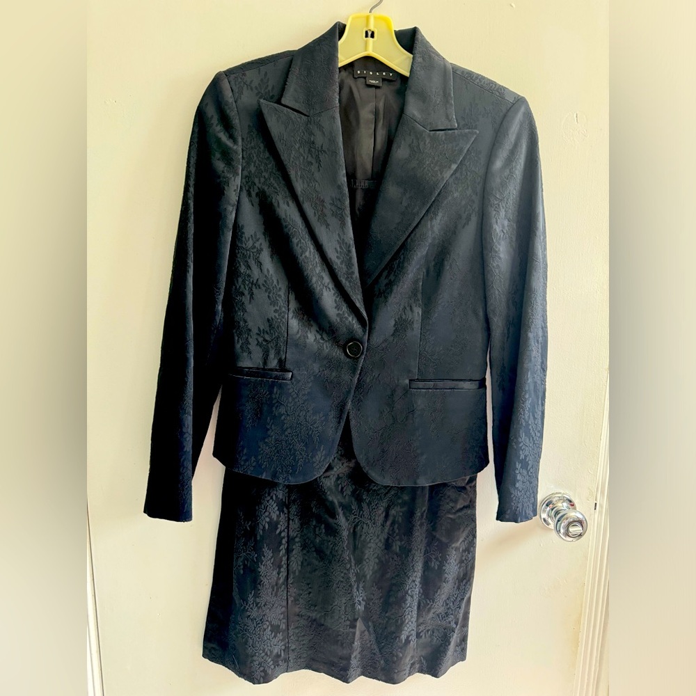 Black sheath dress with long sleeve jacket